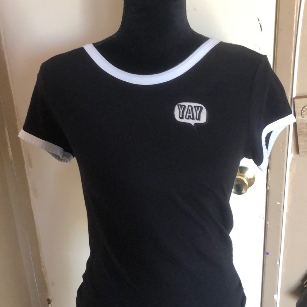 Black tee w/ white trimming and little design